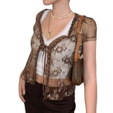 Top corto de encaje de malla transparente